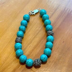 Turquoise and silver bobble bracelet.